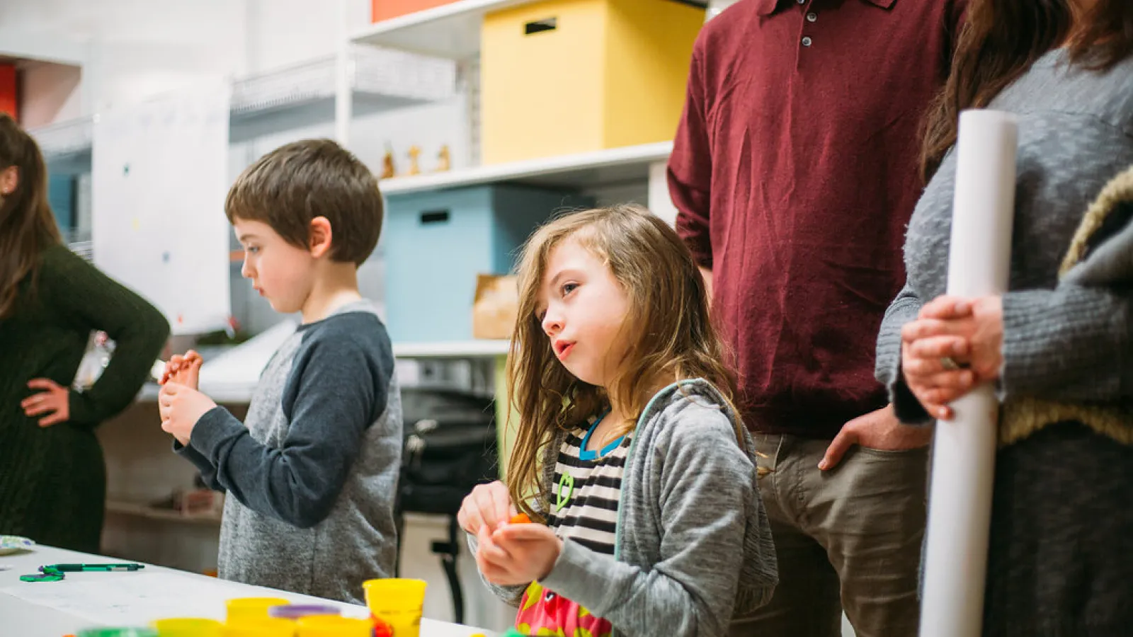 children creating planetary bodies