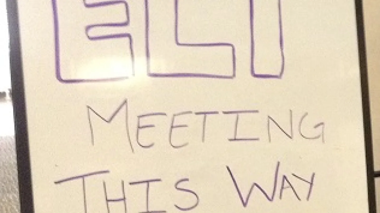 sign that says "ELT meeting this way"