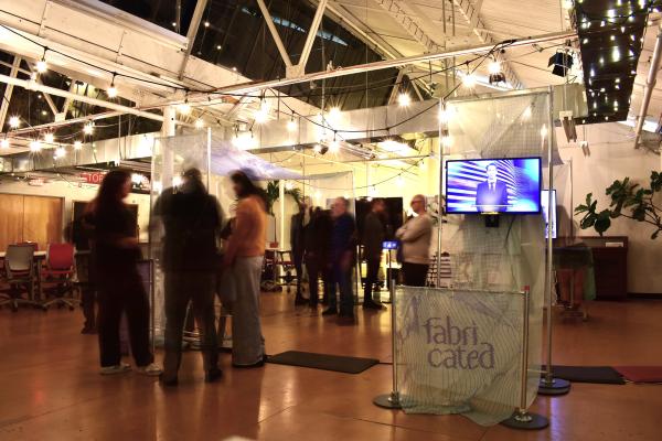 people surrounding exhibit