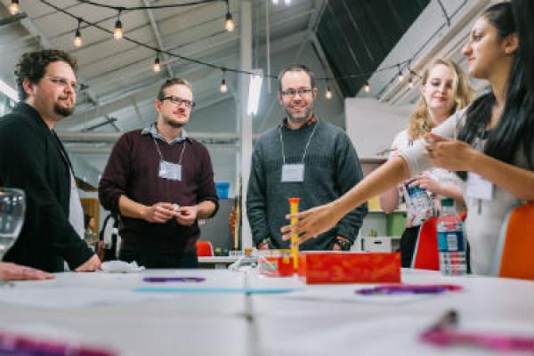 STEAM Members and Interns Playing table games
